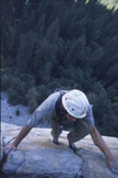 A helmeted climber viewed from above